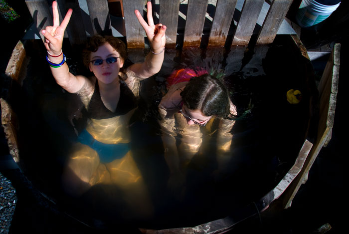 Kids in wood-fired hot tub